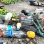 Bottles and garbage washed ashore on a beach