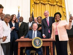 President Biden signing a bill into law