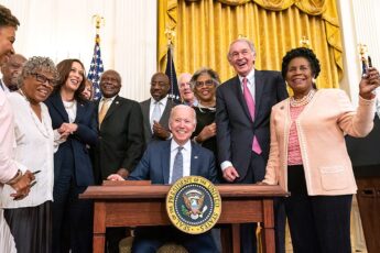 President Biden signing a bill into law