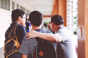 Teacher talking with students