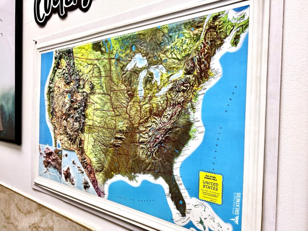 United States relief map hanging in a classroom