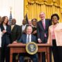 President Biden signing a bill into law