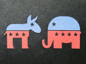 Paper cut-outs of the Republican elephant and the Democrat donkey